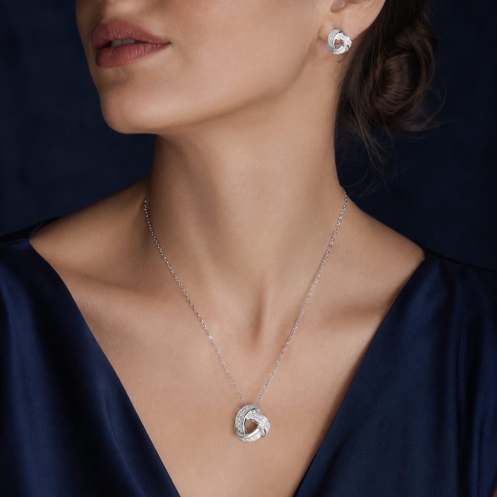Ensemble collier et boucles nœud serti argenté
