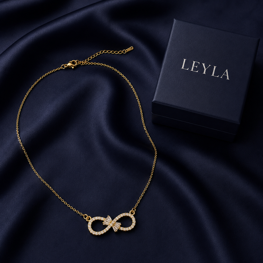 Collier infini pierres blanches doré