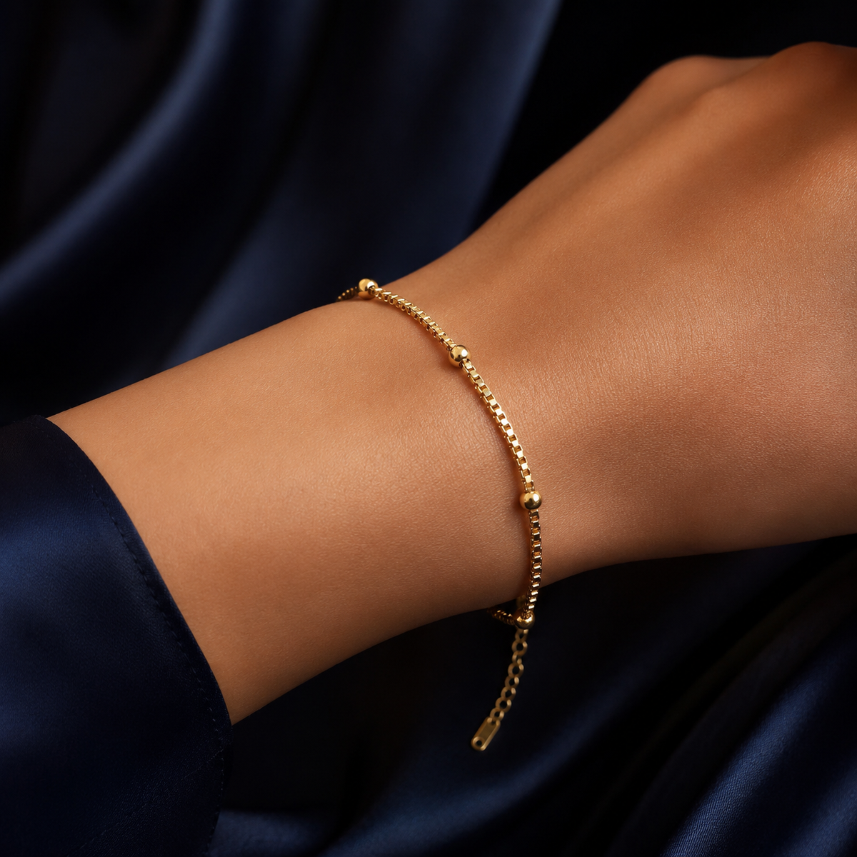 Bracelet chaîne perlée doré