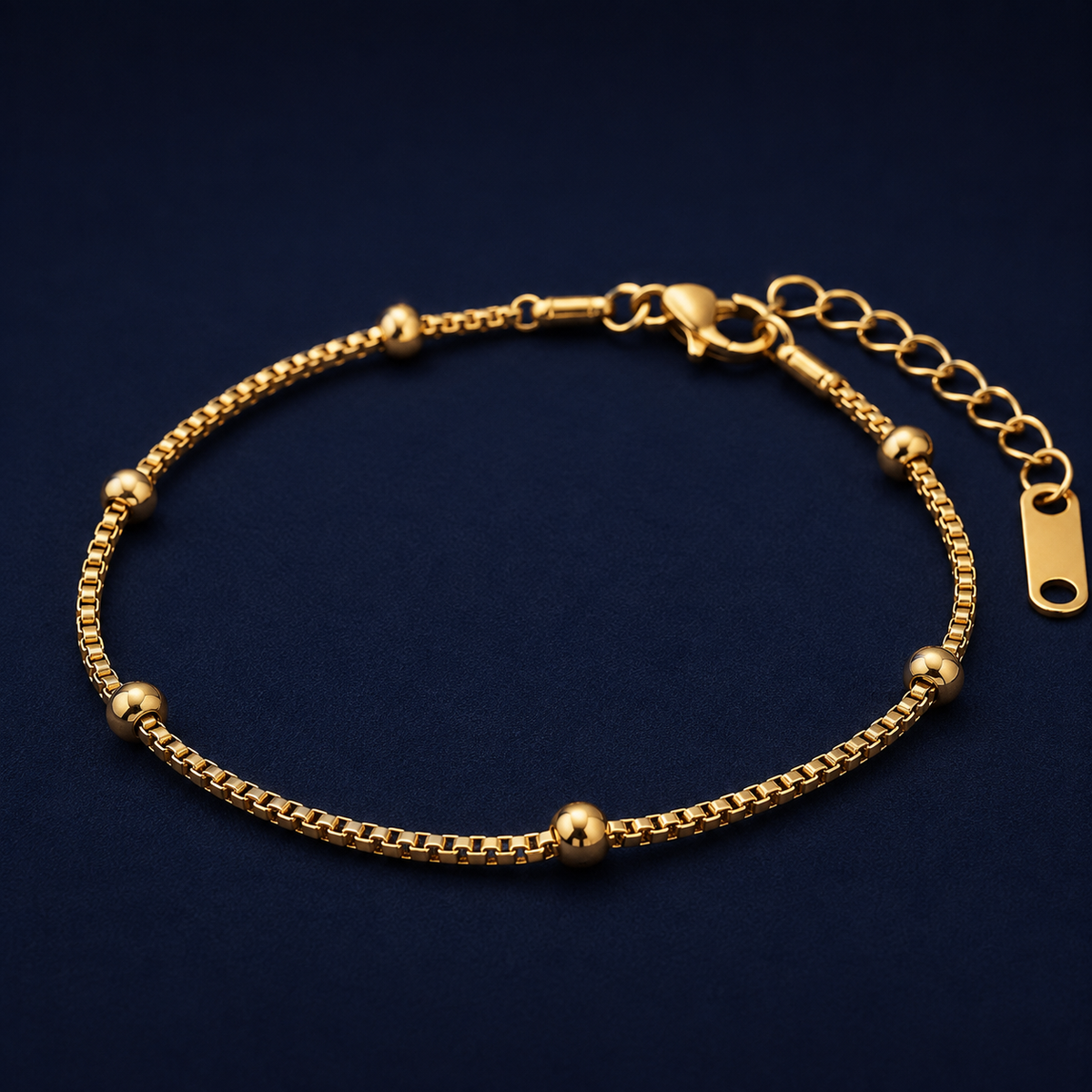 Bracelet chaîne perlée doré