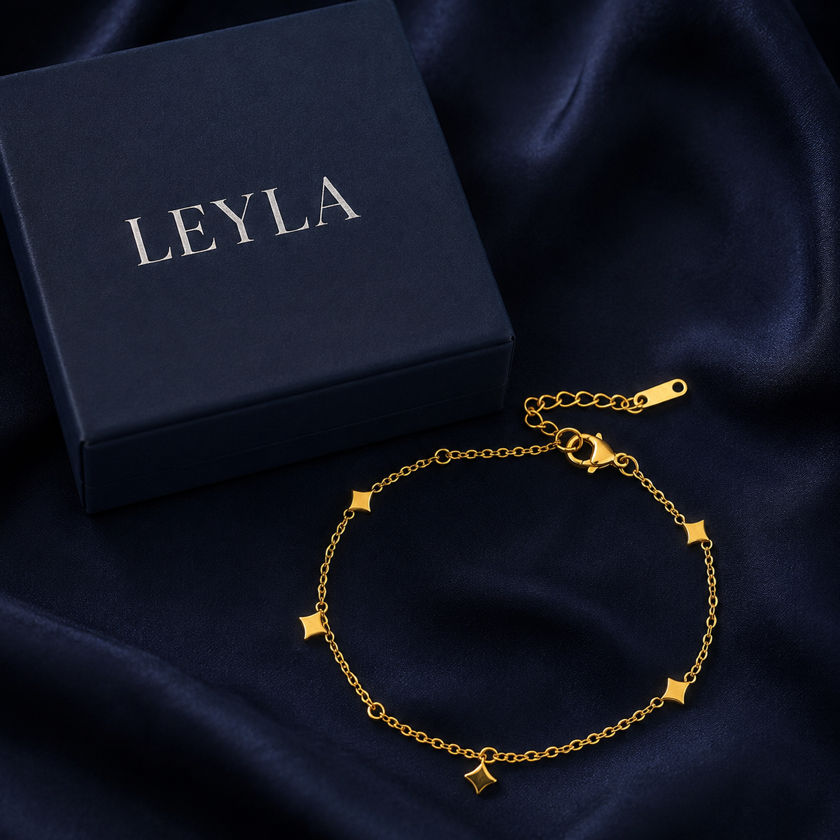 Bracelet étoiles à quatre branches doré