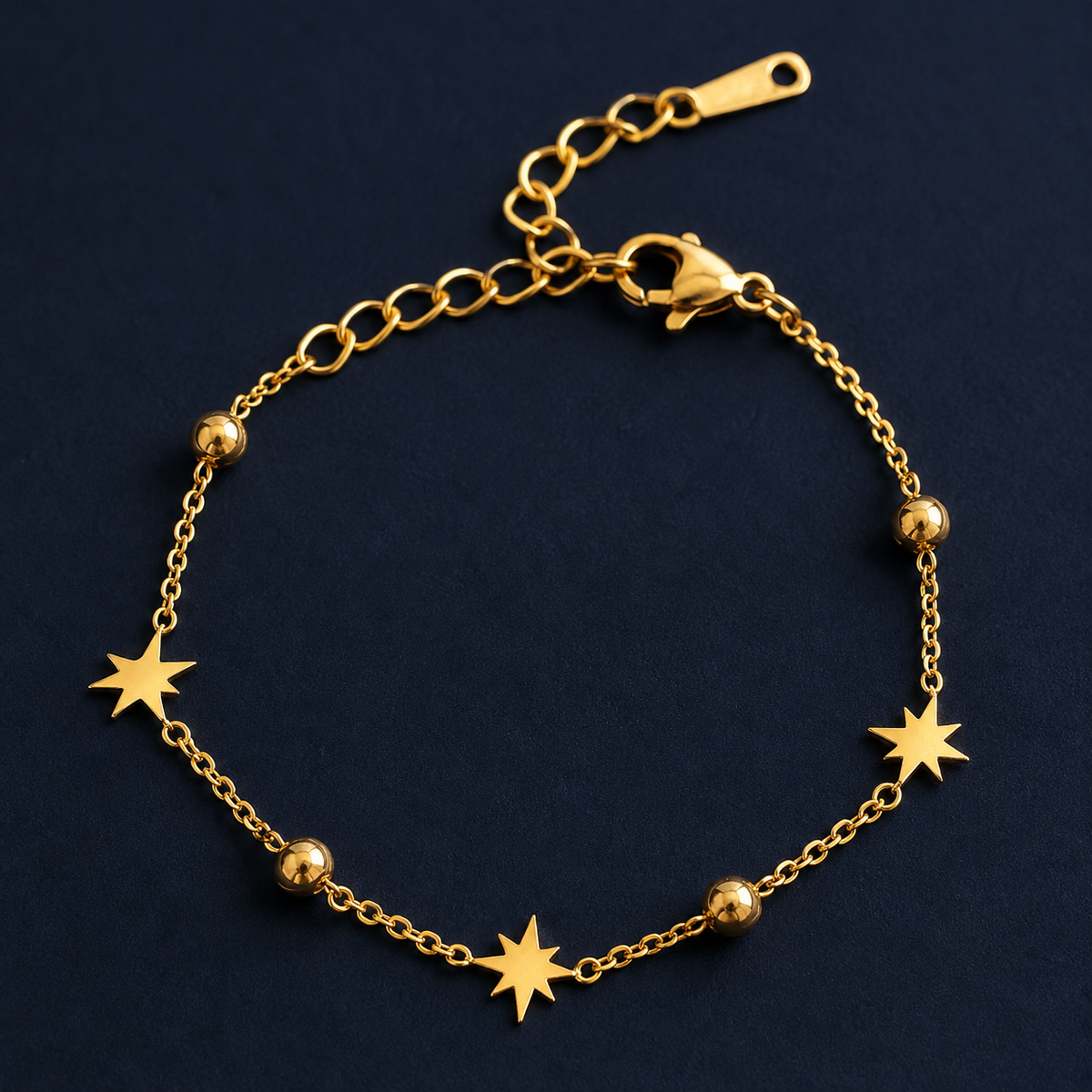 Bracelet étoiles et billes doré